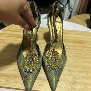 Beautiful heels. Worn once size 6.5 gold embellishment